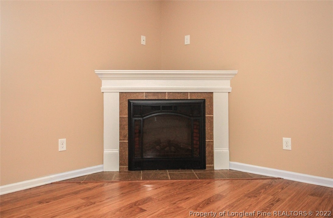 6377 Overhills Road Spring Lake, NC 28390 - Photo 9 of 29 a living room with a fireplace