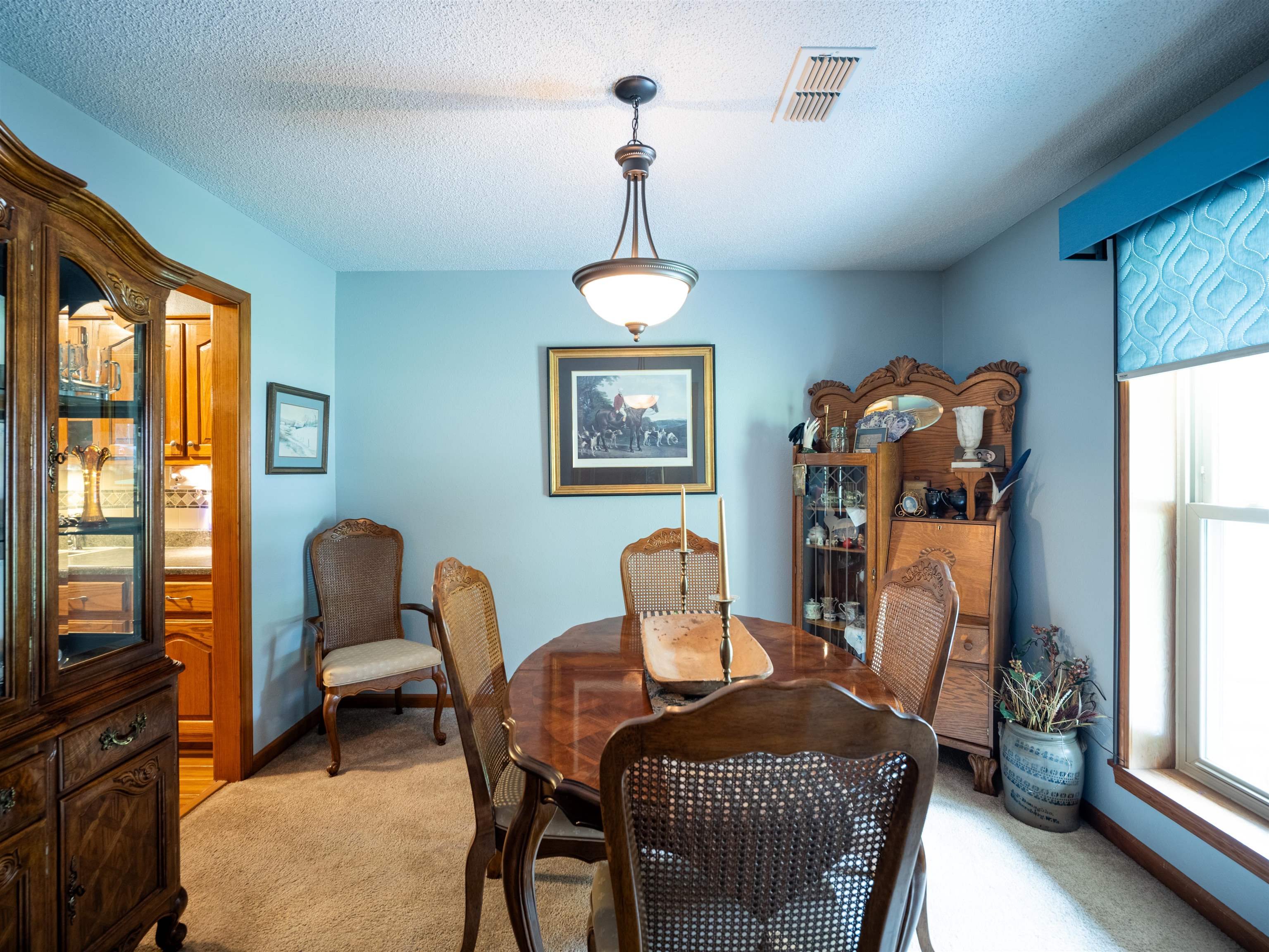 65 Paulette Circle Covington, TN 38019 - Photo 11 of 33 a dining room with furniture a chandelier and window