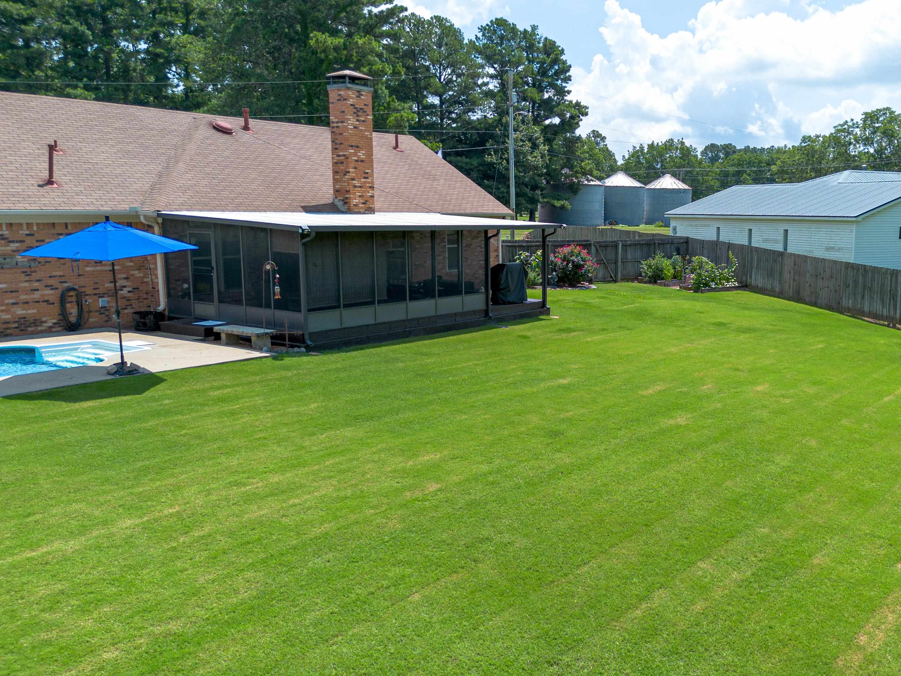 65 Paulette Circle Covington, TN 38019 - Photo 10 of 33 a front view of house with yard and outdoor seating