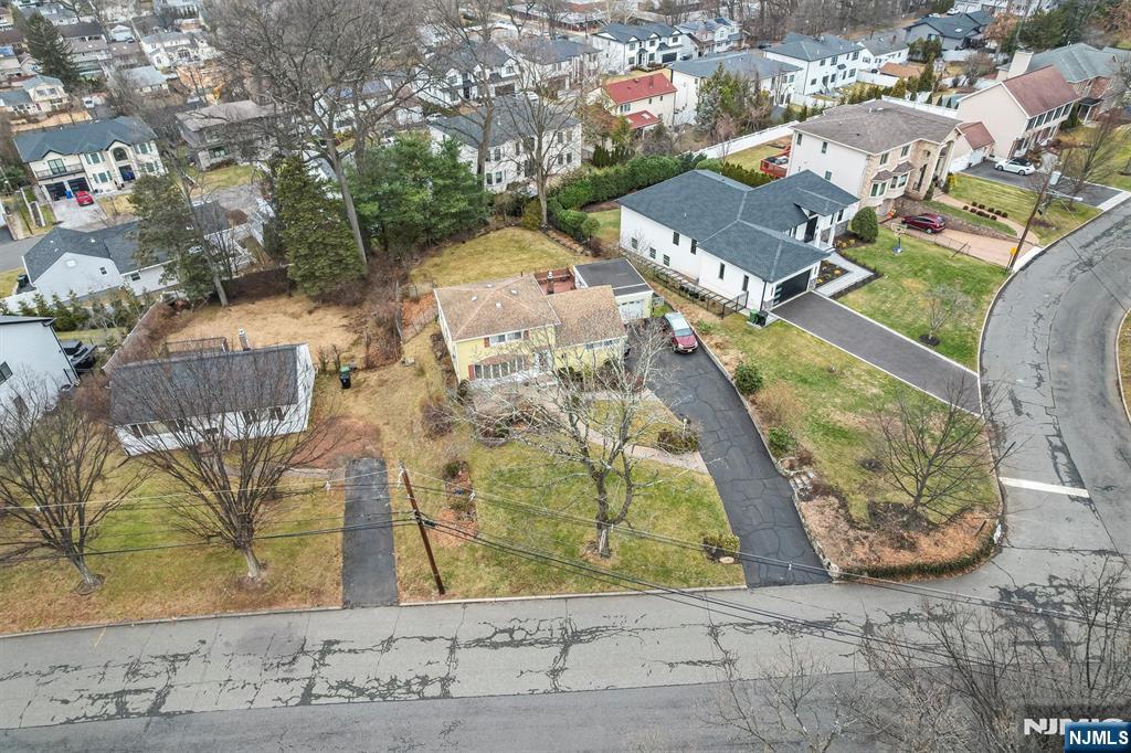 105 Circle Drive Paramus, NJ 07652 - Photo 2 of 14 an aerial view of residential houses with outdoor space