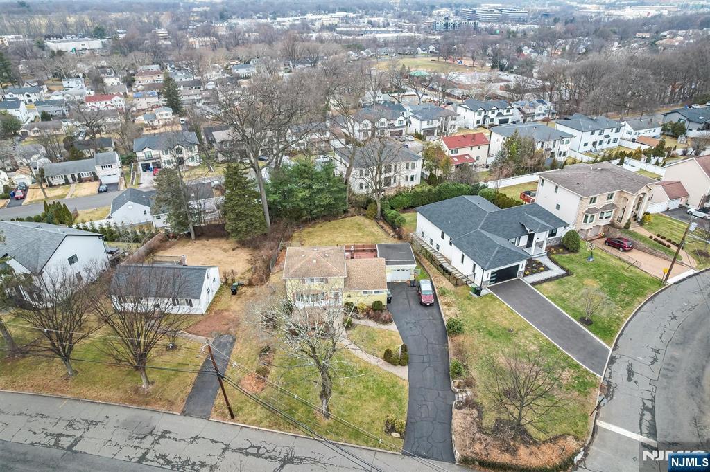 105 Circle Drive Paramus, NJ 07652 - Photo 3 of 14 an aerial view of residential houses with outdoor space