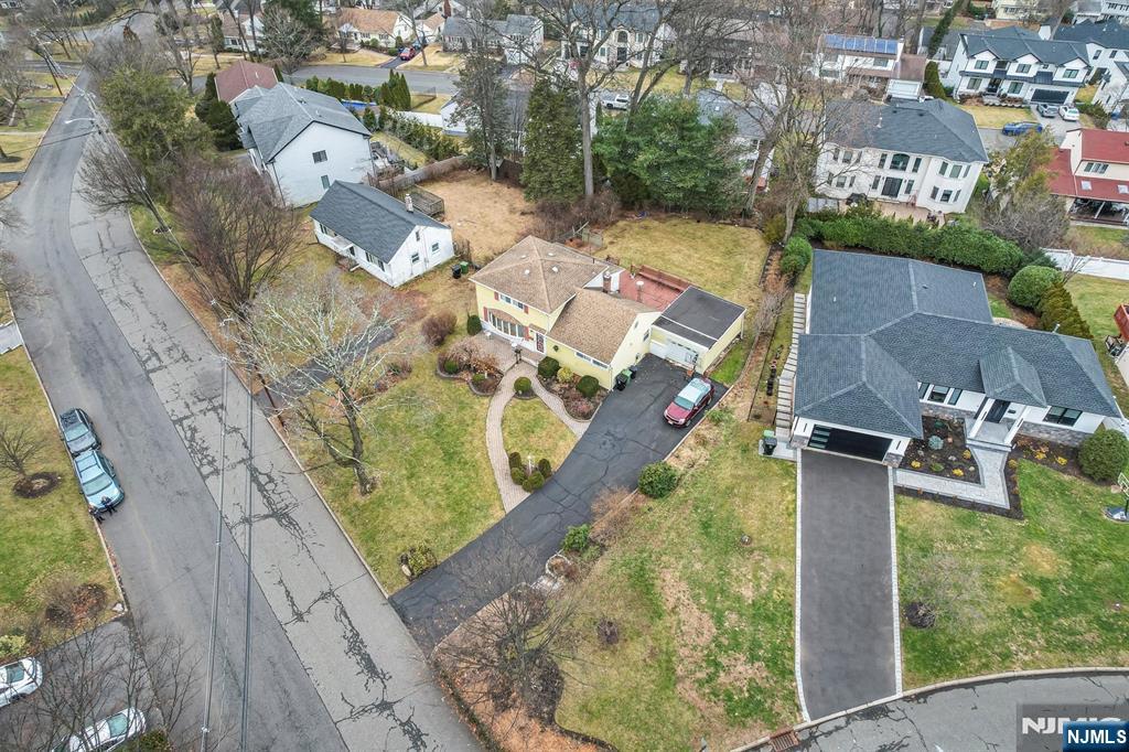 105 Circle Drive Paramus, NJ 07652 - Photo 4 of 14 an aerial view of residential houses with outdoor space