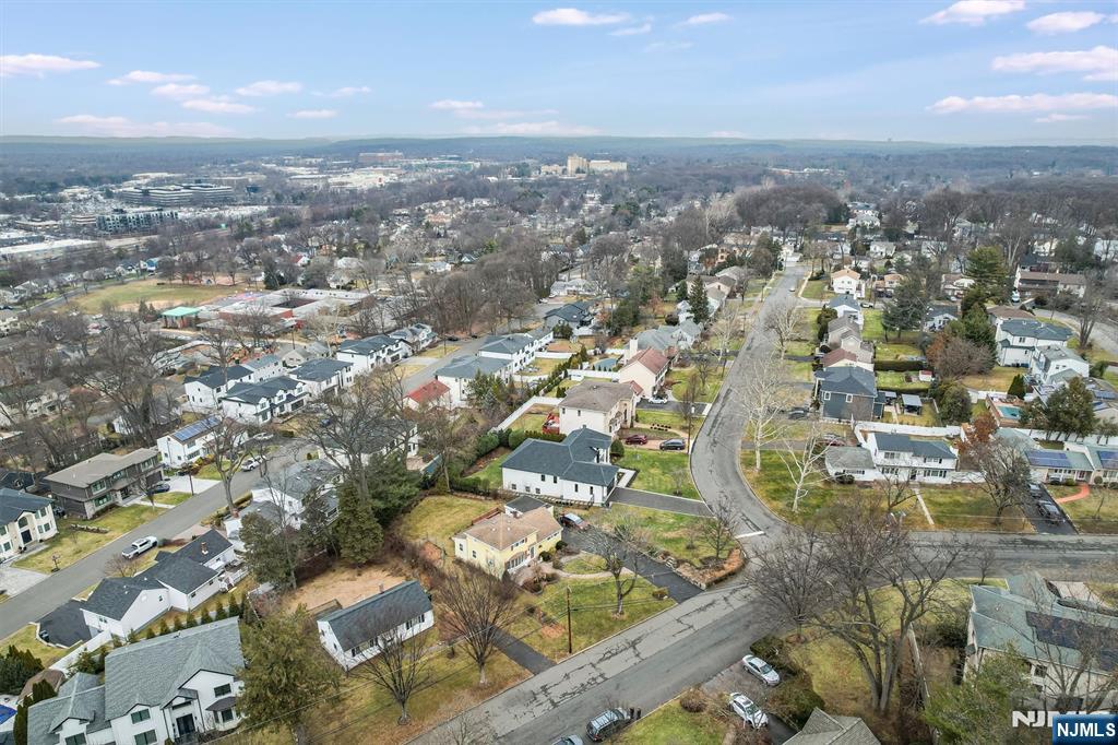 105 Circle Drive Paramus, NJ 07652 - Photo 9 of 14 an aerial view of residential houses with city view