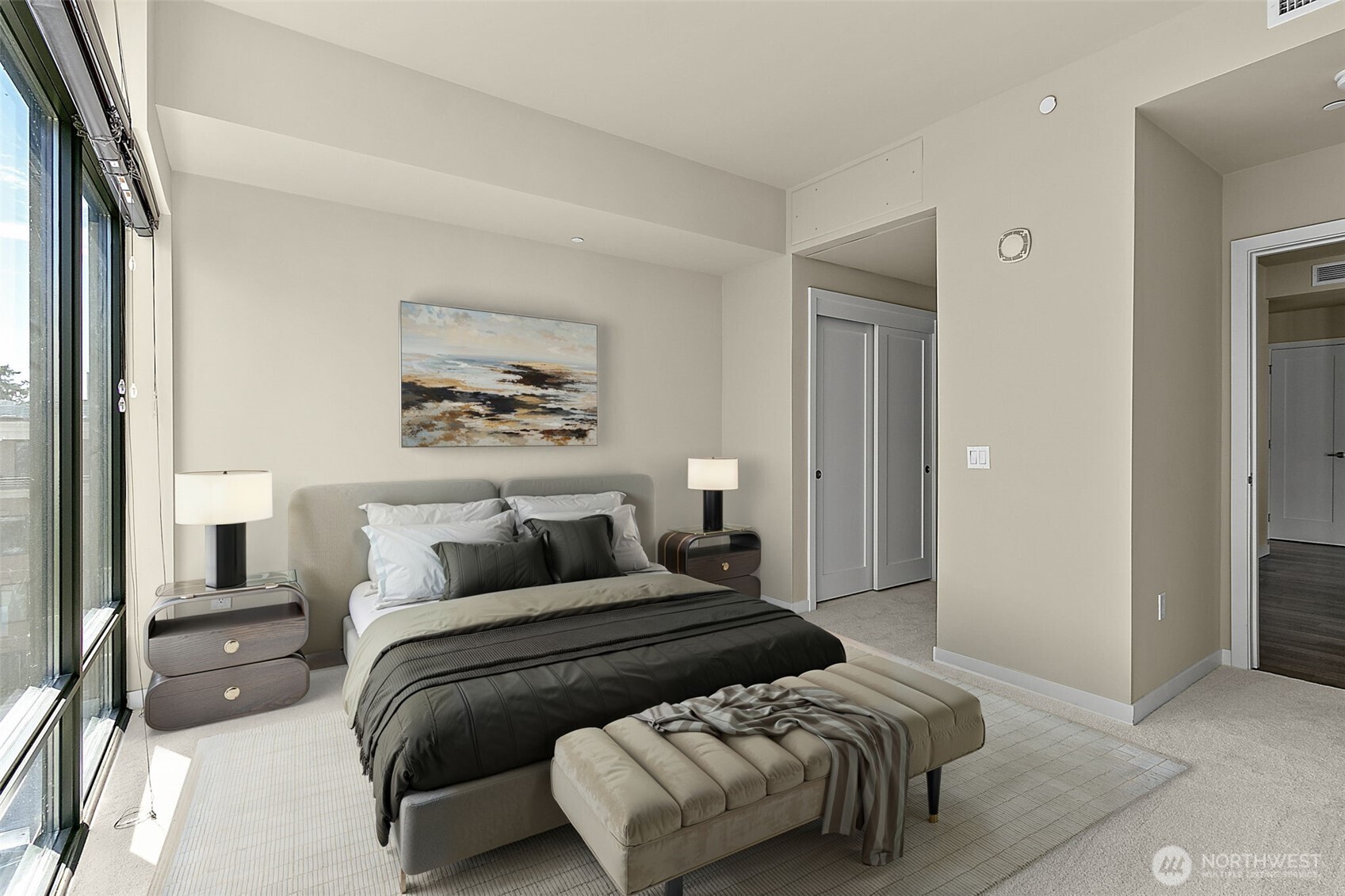 10000 Main Street, Unit 504 Bellevue, WA 98004 - Photo 14 of 37 a bedroom with a large bed and a couch