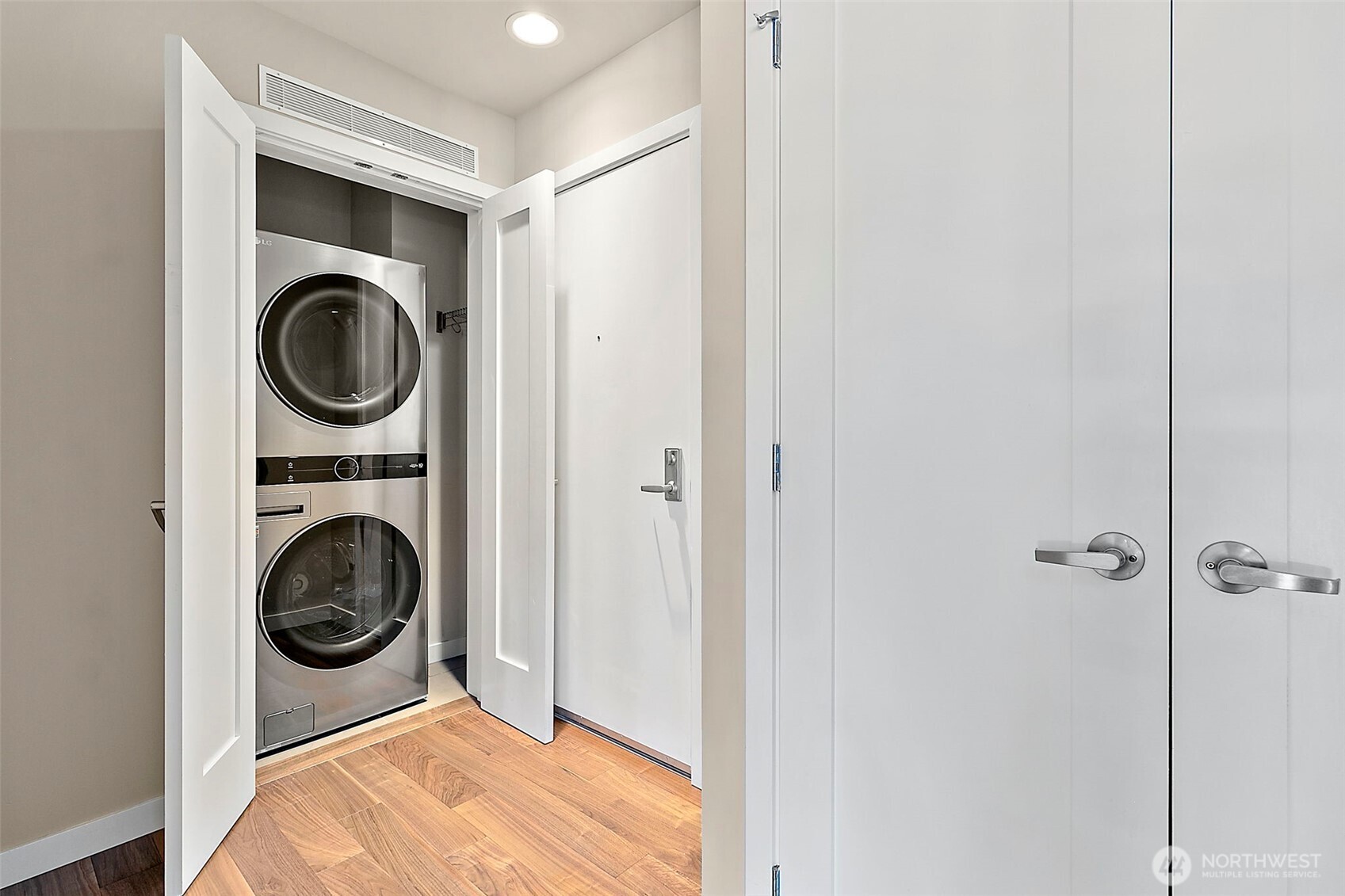 10000 Main Street, Unit 504 Bellevue, WA 98004 - Photo 21 of 37 a utility room with dryer and washer