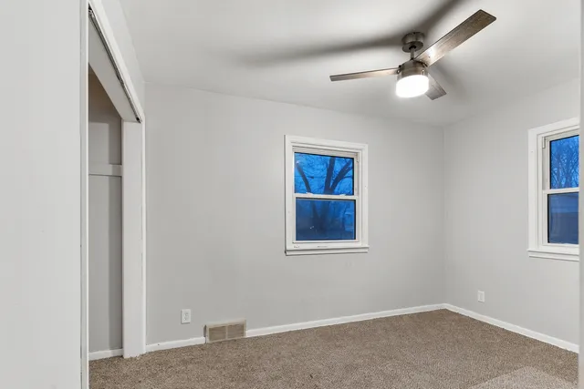 a view of a kitchen cabinets and wooden floor