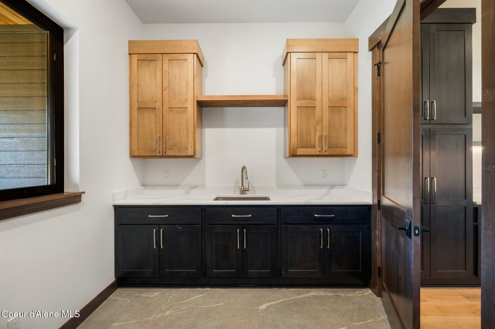 11 Alpenrose Lane Sandpoint, ID 83864 - Photo 18 of 52 Functional Laundry Room