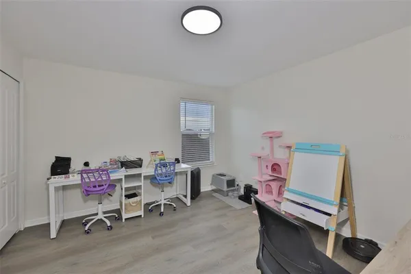 a living room with couch and a table