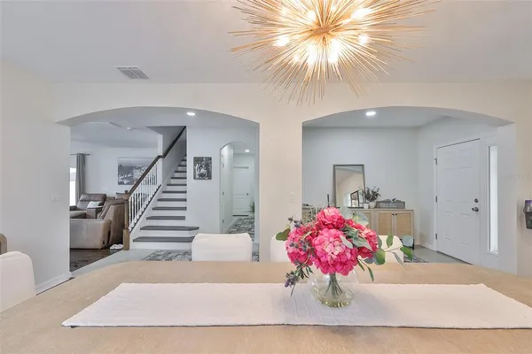 a view of entryway and kitchen
