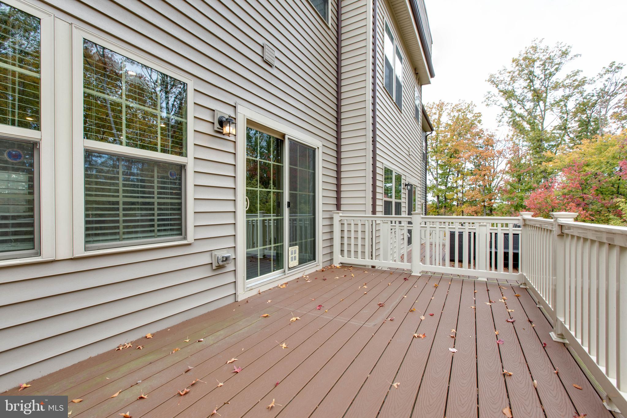 3004 Cornfield Avenue Hanover, MD 21076 - Photo 21 of 50 a view of a wooden deck with a yard