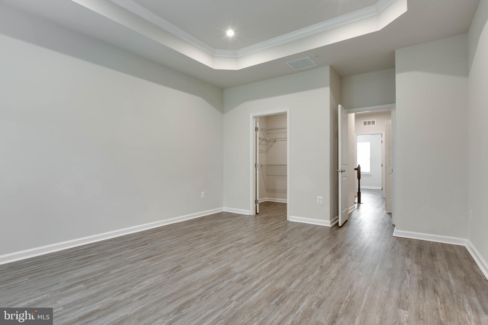 3004 Cornfield Avenue Hanover, MD 21076 - Photo 25 of 50 a view of a room with wooden floor