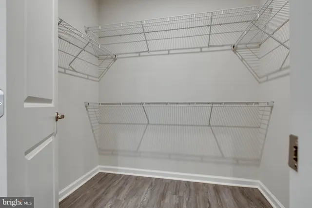 a view of a room with racks on the wall