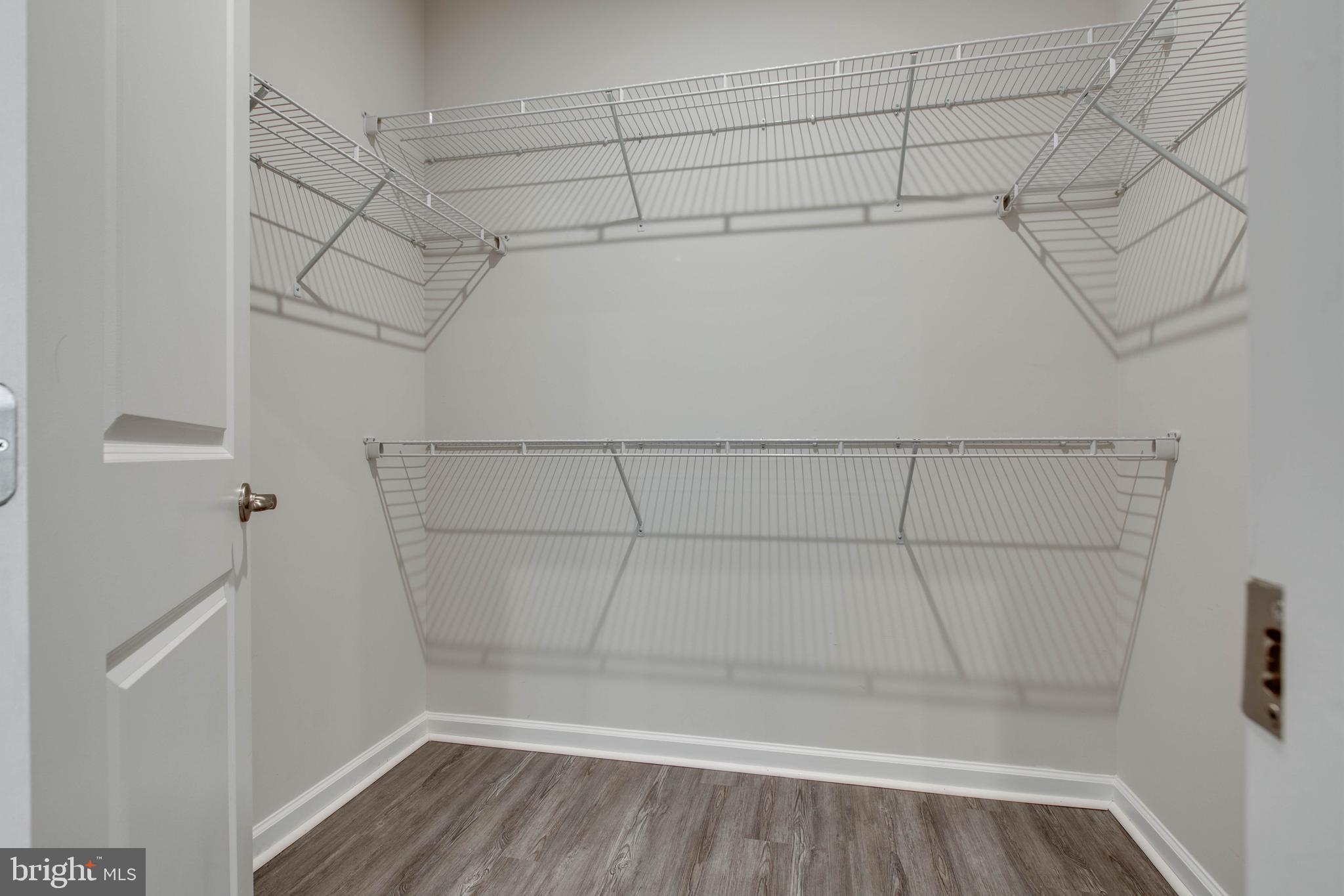 3004 Cornfield Avenue Hanover, MD 21076 - Photo 27 of 50 a view of a room with racks on the wall