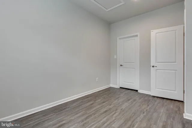 a view of room with hardwood floor