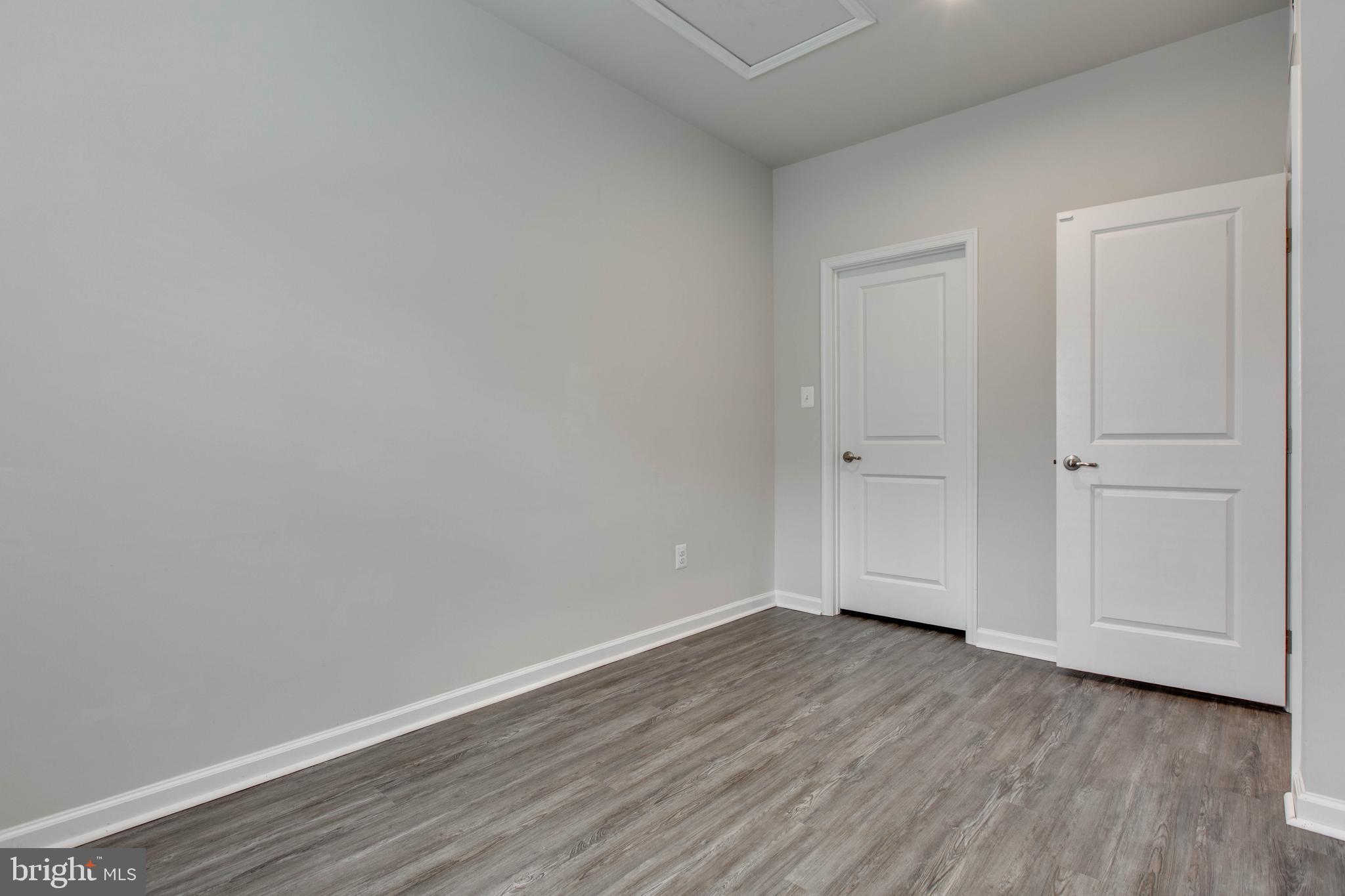 3004 Cornfield Avenue Hanover, MD 21076 - Photo 32 of 50 a view of room with hardwood floor