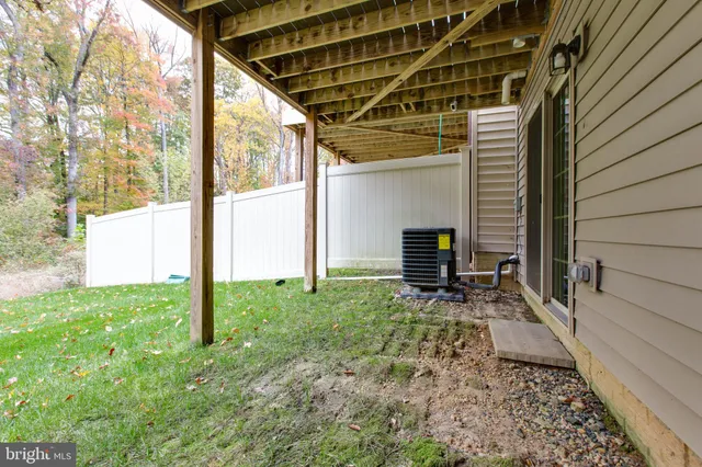 a backyard of a house with seating space