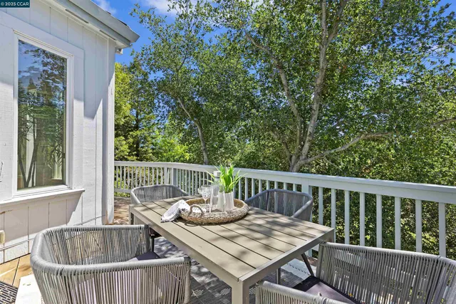 a bedroom with a large bed and a large window