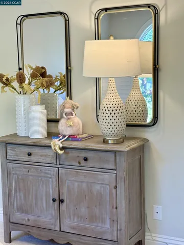 a view of a two chairs on the roof deck