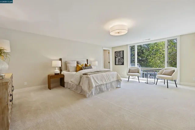 a view of a chairs and table in patio