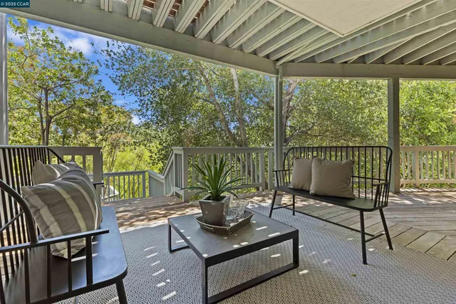 a view of swimming pool from a balcony