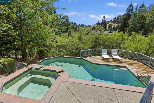 a view of a street with a tree