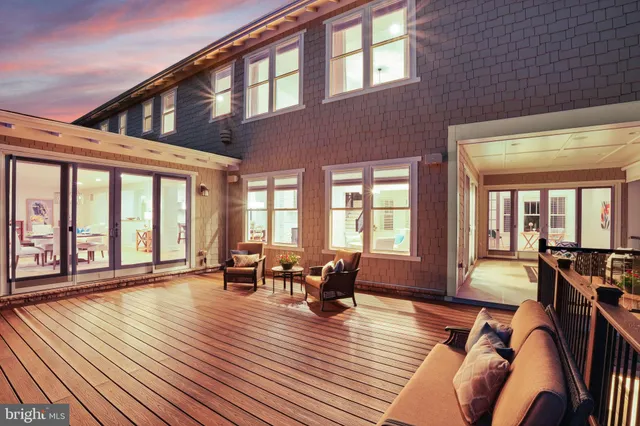 a view of entryway livingroom and hall with wooden floor