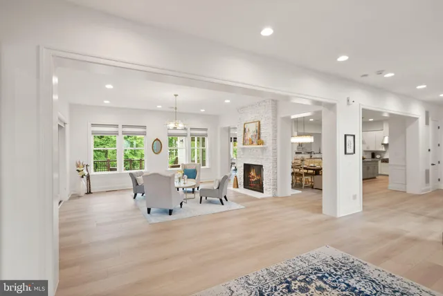 a bathroom with a granite countertop sink toilet a mirror and shower