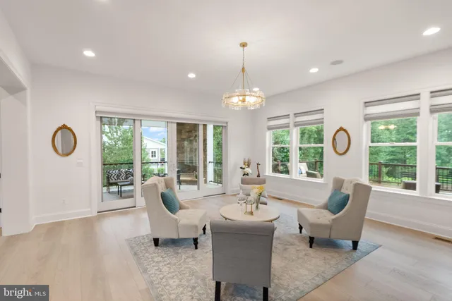 a front view of a house with swimming pool and a yard