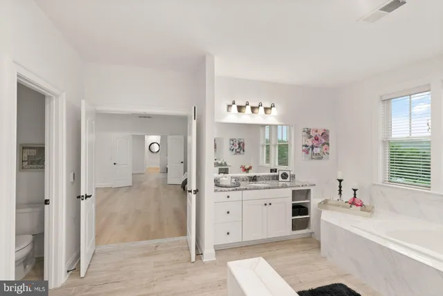 a view of a terrace with couches and a table