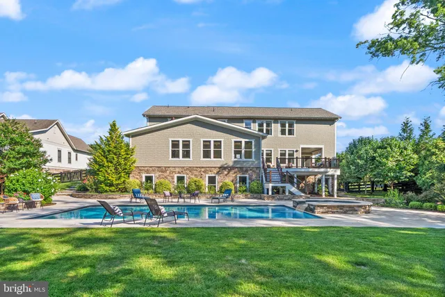a kitchen with granite countertop a sink and a window