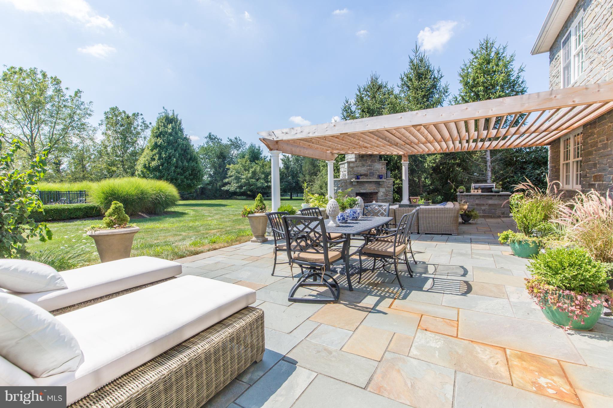 50 Woodhill Road Newtown, PA 18940 - Photo 29 of 43 Outdoor living area w/ fireplace & cooking station