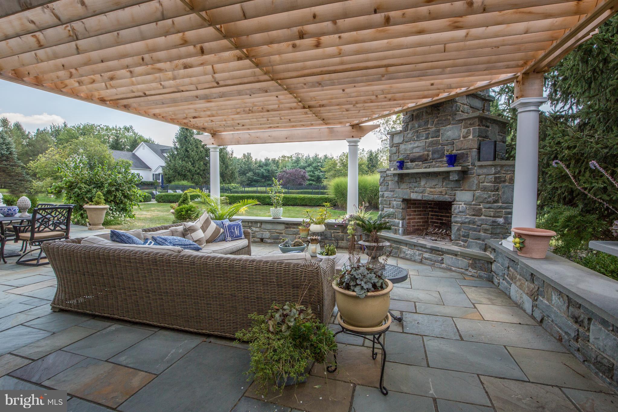 50 Woodhill Road Newtown, PA 18940 - Photo 31 of 43 Outdoor living area w/ fireplace & cooking station