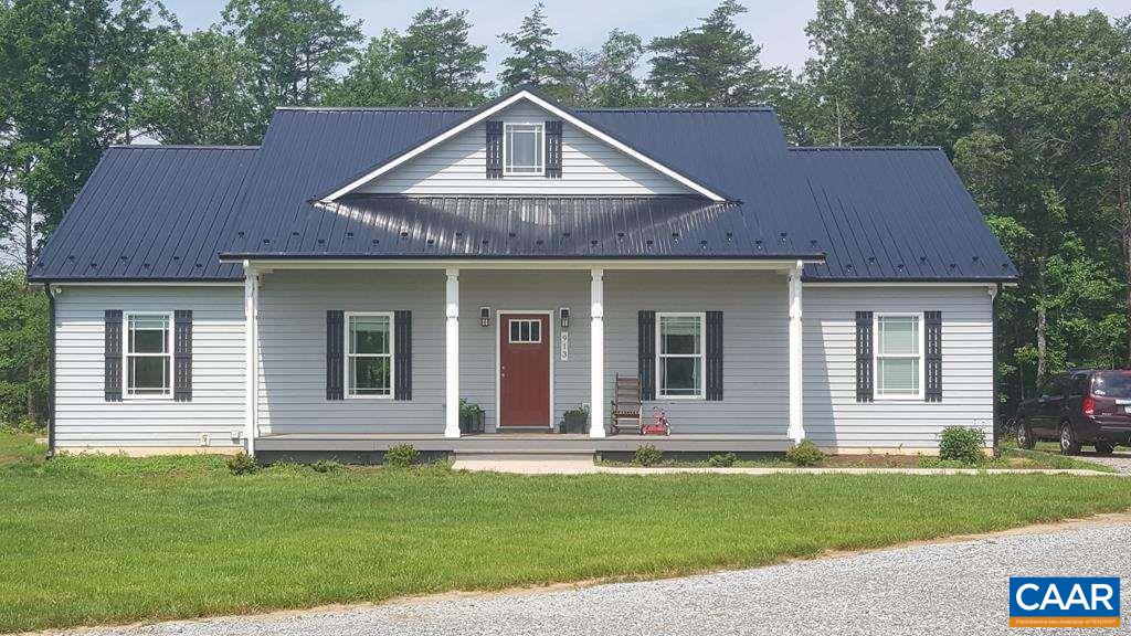 913 Plank Road Farmville, VA 23901 - Photo 1 of 16 a front view of a house with a garden