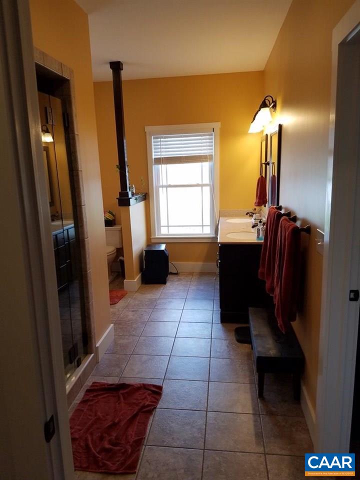 913 Plank Road Farmville, VA 23901 - Photo 11 of 16 a kitchen with stainless steel appliances a sink and a refrigerator