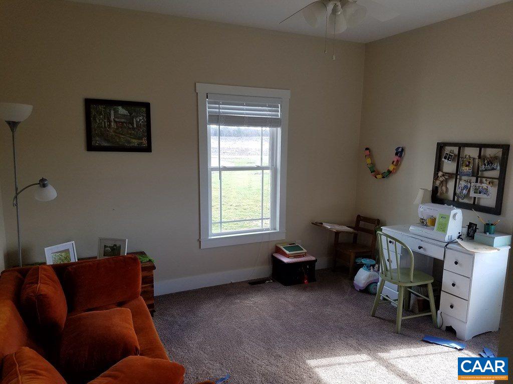 913 Plank Road Farmville, VA 23901 - Photo 12 of 16 a living room with furniture and a window