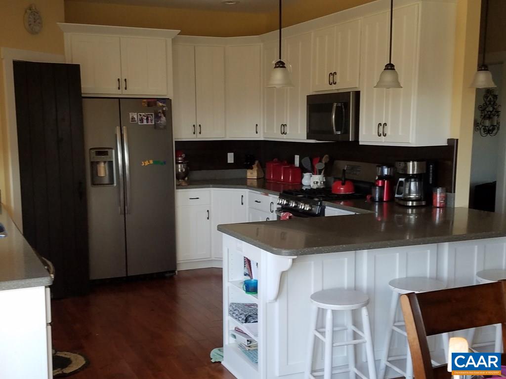 913 Plank Road Farmville, VA 23901 - Photo 4 of 16 a kitchen with stainless steel appliances granite countertop a refrigerator and a sink