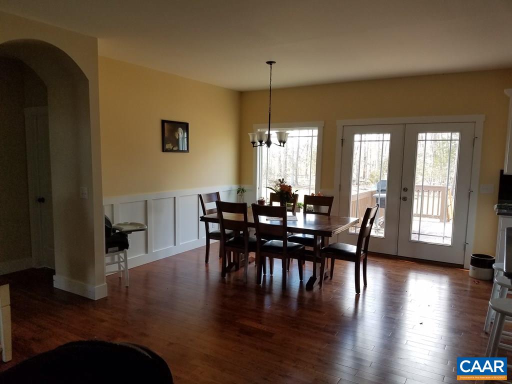 913 Plank Road Farmville, VA 23901 - Photo 6 of 16 a view of a a dining room with furniture window and wooden floor