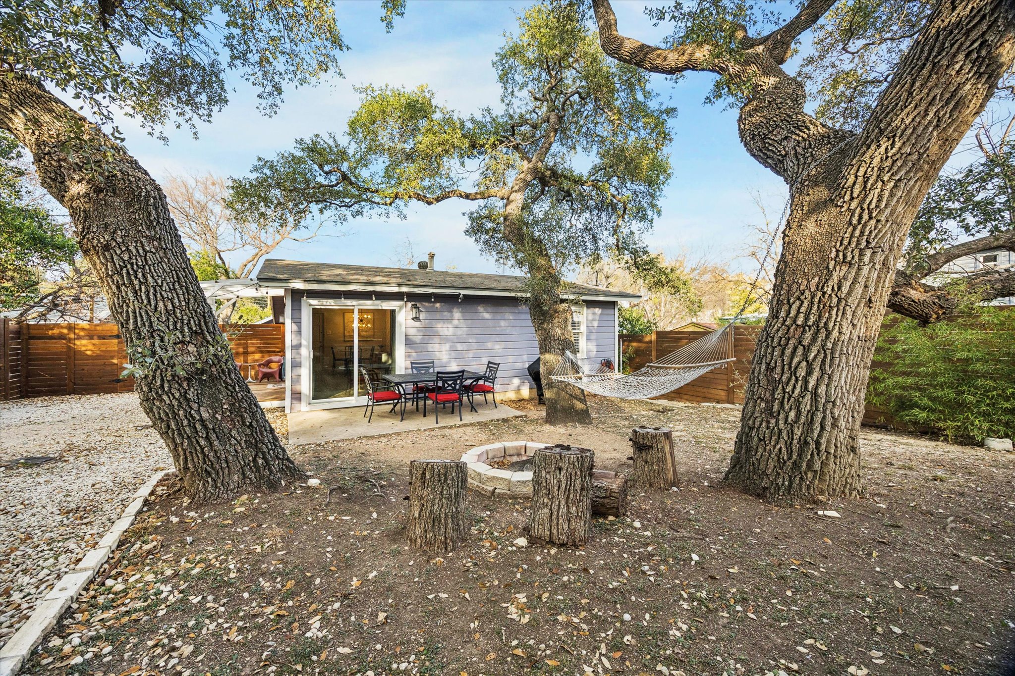 211 Lessin Lane, Unit C Austin, TX 78704 - Photo 2 of 14 a view of a house with backyard porch and sitting area