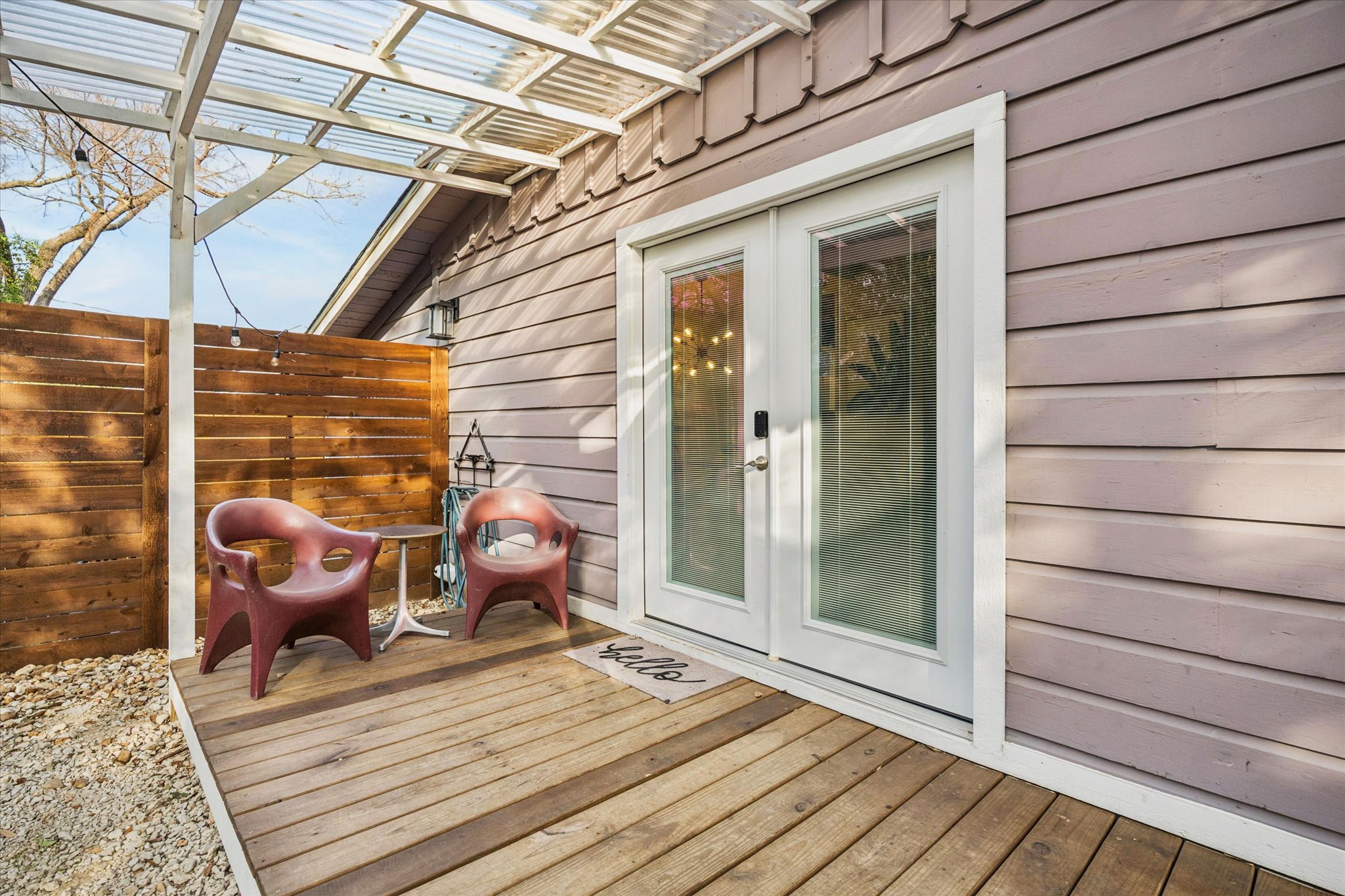 211 Lessin Lane, Unit C Austin, TX 78704 - Photo 4 of 14 a view of a balcony with furniture