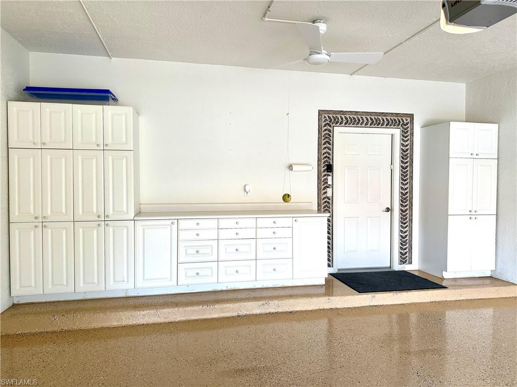 5770 Grande Reserve Way, Unit 1501 Naples, FL 34110 - Photo 17 of 18 a view of an empty room with a window