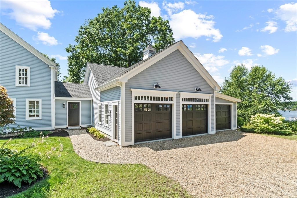 473 Main Street Amesbury, MA 01913 - Photo 15 of 42 a view of a house with yard and plants