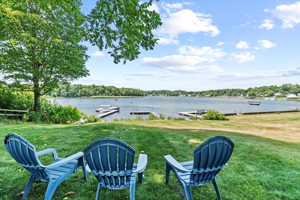 473 Main Street Amesbury, MA 01913 - Photo 20 of 42 a view of a table and chairs in the garden