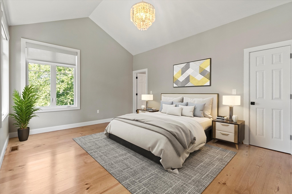 473 Main Street Amesbury, MA 01913 - Photo 23 of 42 a bedroom with a bed and a window