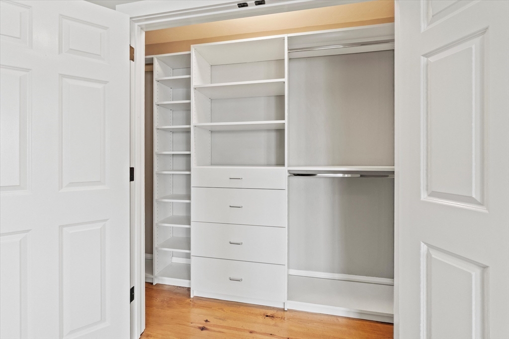 473 Main Street Amesbury, MA 01913 - Photo 31 of 42 a view of walk in closet with empty racks