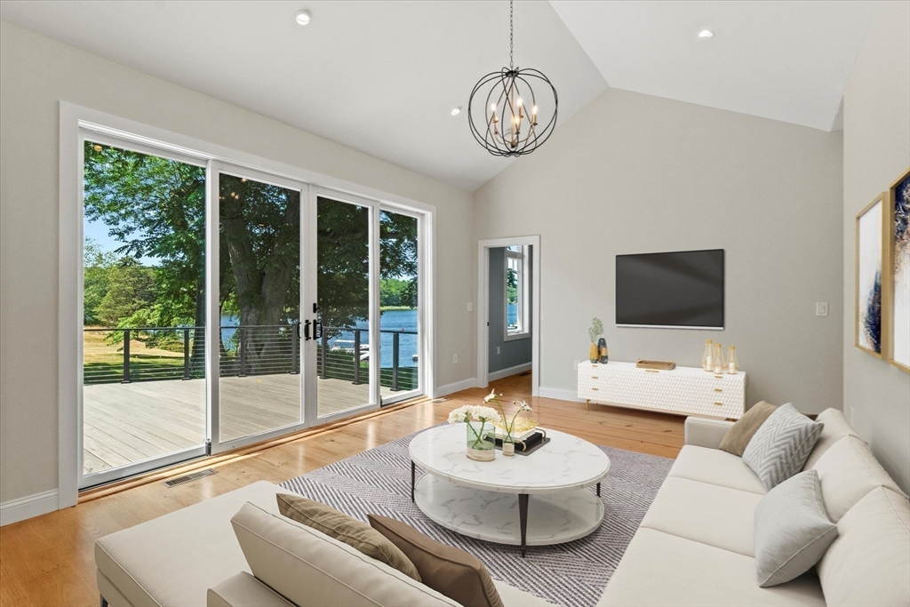 473 Main Street Amesbury, MA 01913 - Photo 10 of 42 a living room with furniture and a large window