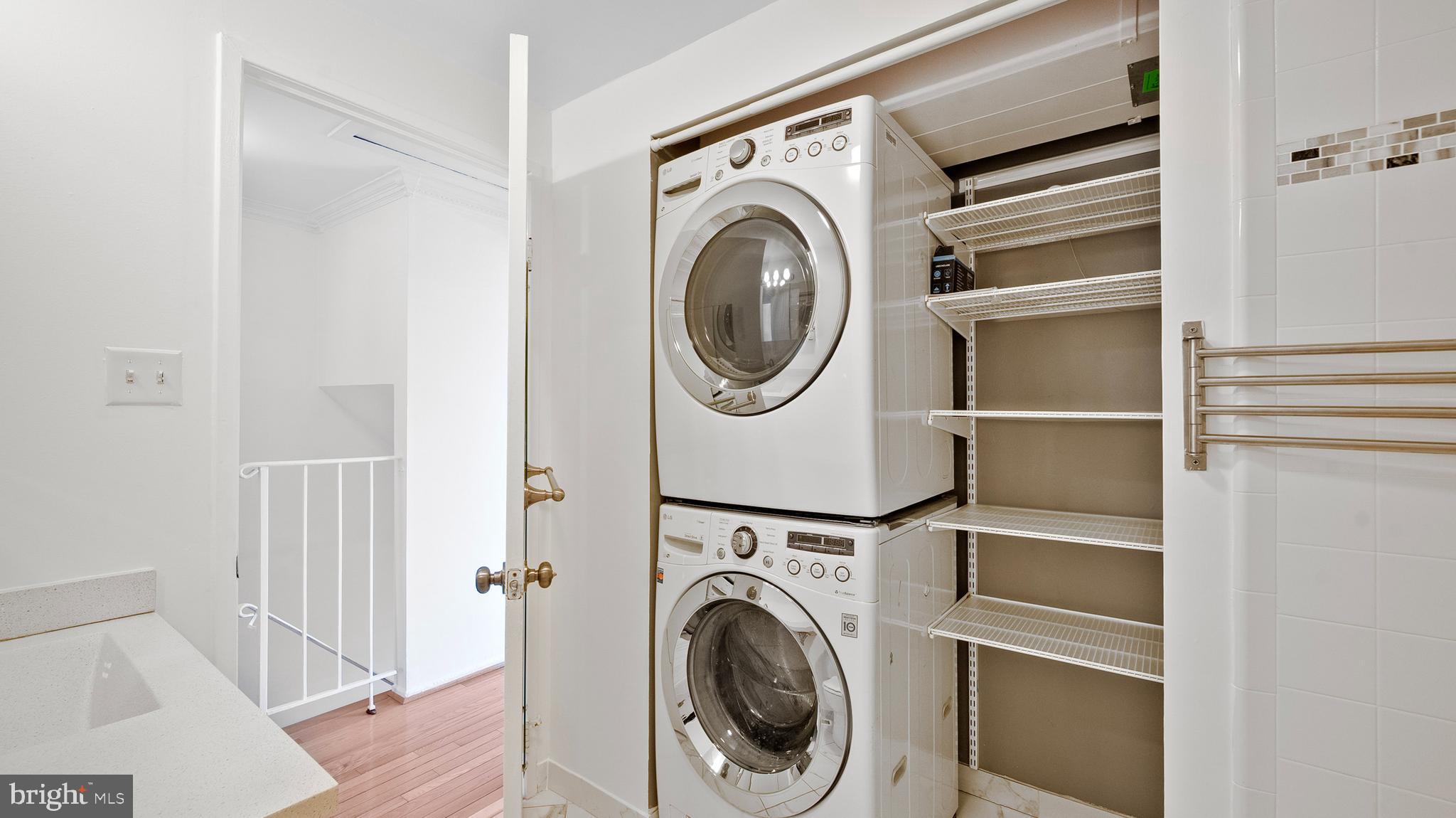 10710 Lester Street Silver Spring, MD 20902 - Photo 16 of 24 a utility room with dryer and washer