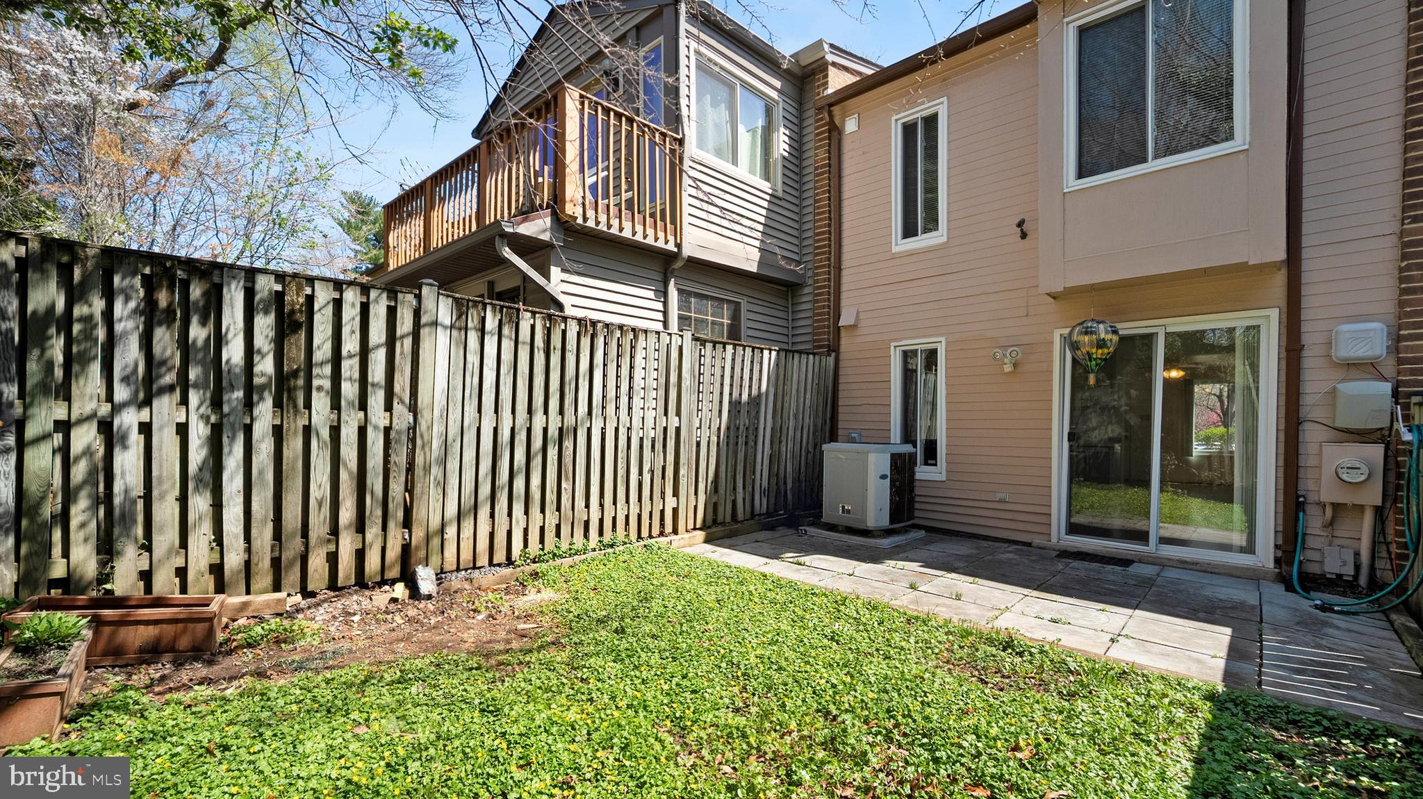 10710 Lester Street Silver Spring, MD 20902 - Photo 22 of 24 a view of a house with a wooden fence