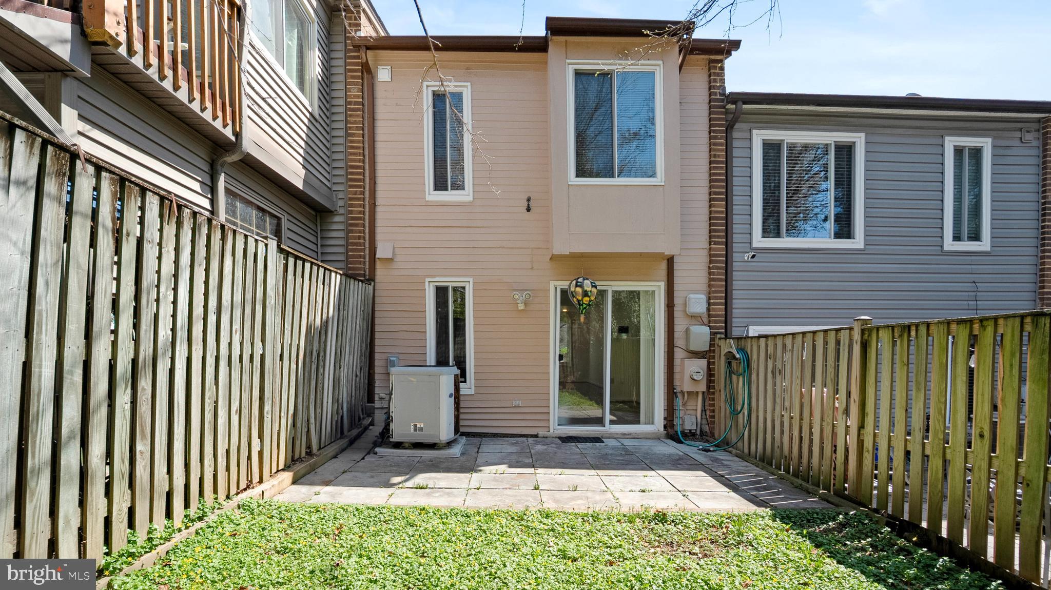 10710 Lester Street Silver Spring, MD 20902 - Photo 23 of 24 a front view of a house with a garden