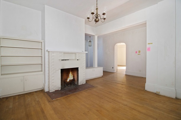 26 MacArthur Loop Highland Park, IL 60035 - Photo 15 of 47 a view of empty room with a fireplace and wooden floor