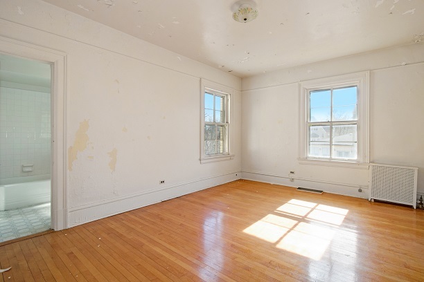 26 MacArthur Loop Highland Park, IL 60035 - Photo 23 of 47 a view of empty room with wooden floor and fan